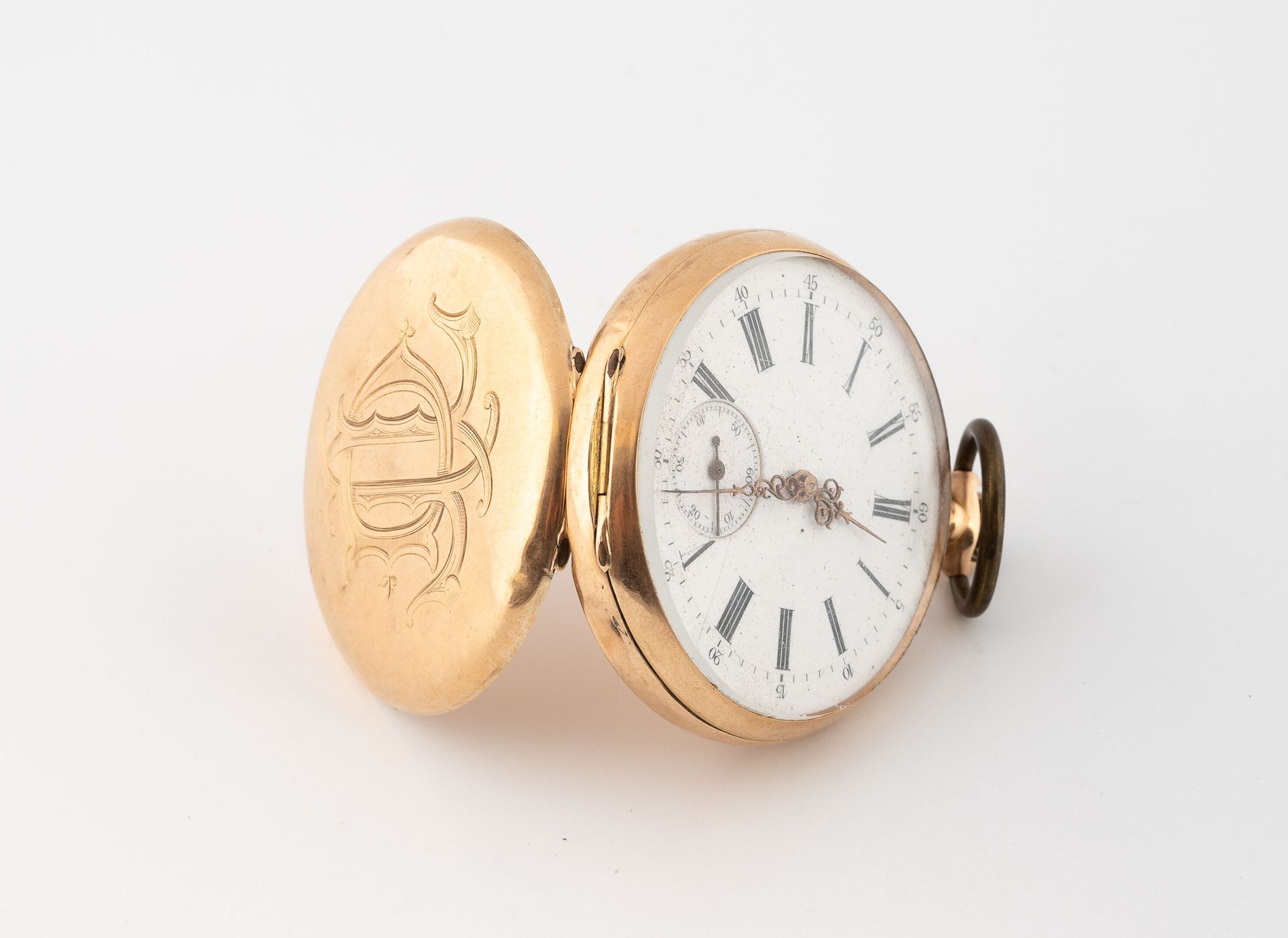 Null Pocket watch in yellow gold (750).
Back cover engraved with D.J.L.
White en&hellip;