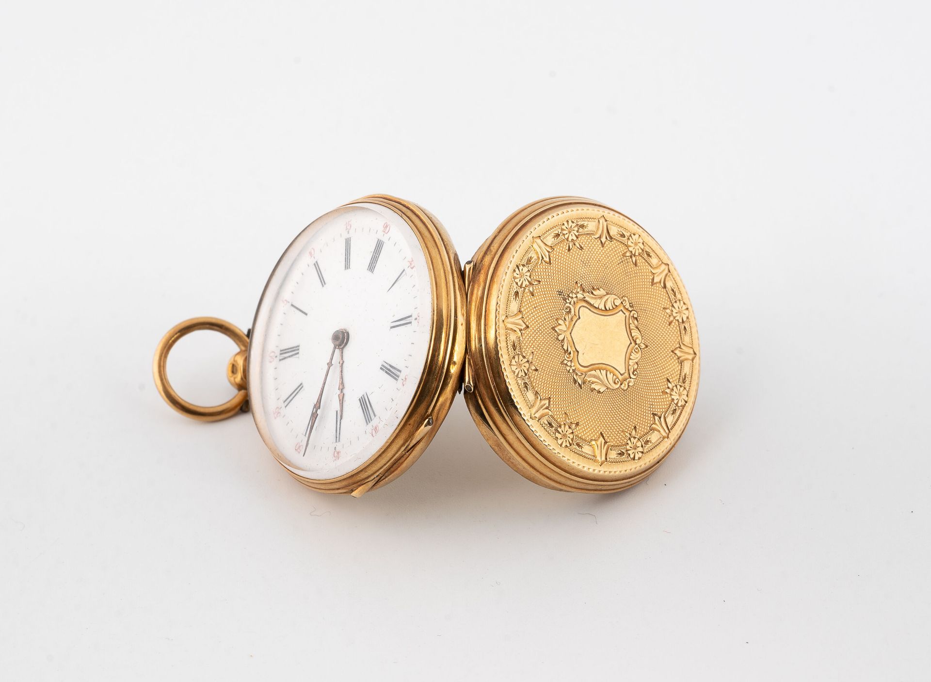 Null Reloj de bolsillo de oro amarillo (750).
Tapa trasera decorada con una cart&hellip;