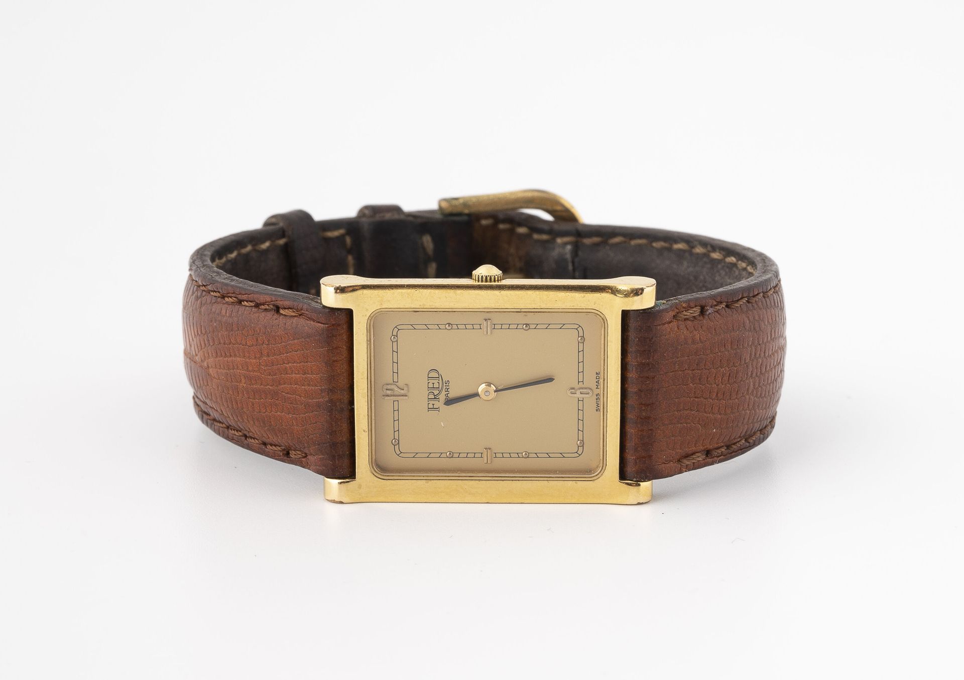 FRED Watch bracelet.
Rectangular case in gilded metal and steel.
Dial with gilde&hellip;