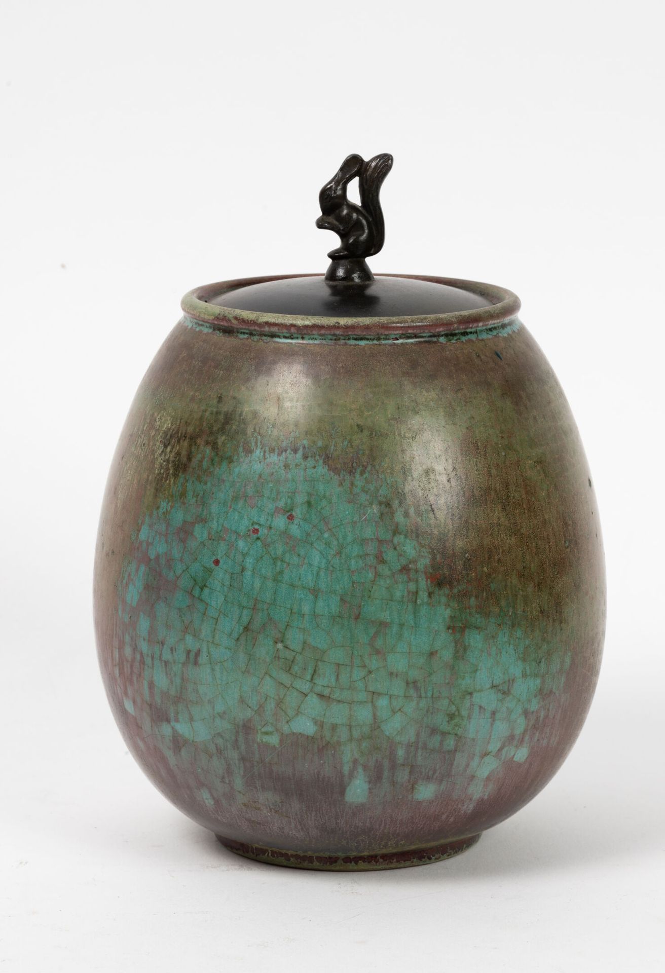 BORNHOLM Vase.
In glazed ceramic.
Mark on the back.
Lid in patinated bronze.
H. &hellip;