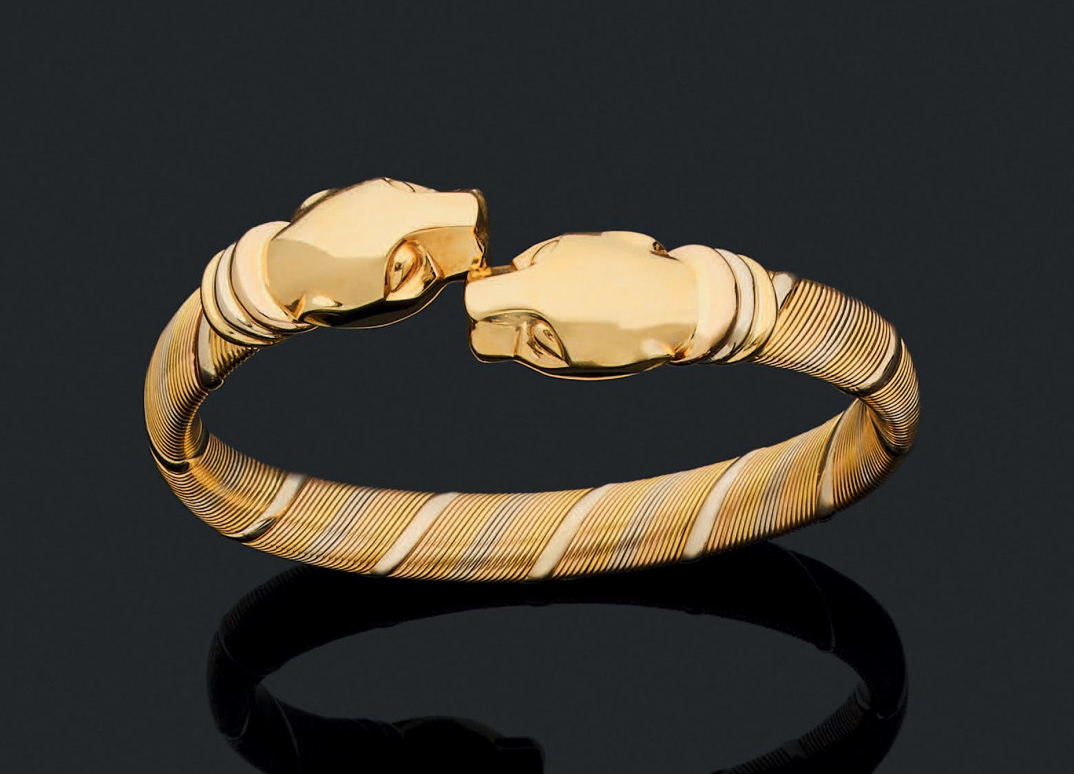 CARTIER Paris Bracelet jonc Panthère en filins d'or torsadés de trois tons jaune&hellip;