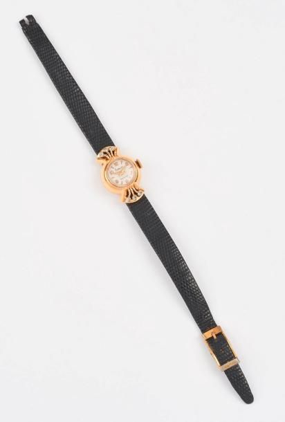 FLAMOR 

Montre bracelet de femme.

Boîtier rond en or jaune (750).

Cadran blan&hellip;
