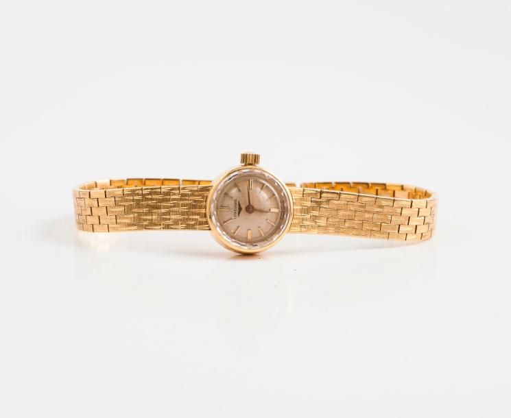 LONGINES 

Montre bracelet de dame en or jaune (750) 

Cadran circulaire à fond &hellip;