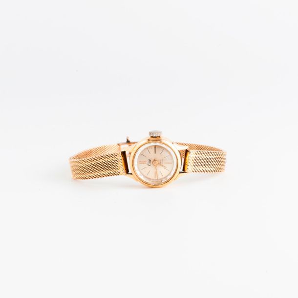 EMO 

Montre bracelet de dame en or jaune (750).

Boîtier circulaire.

Cadran à &hellip;