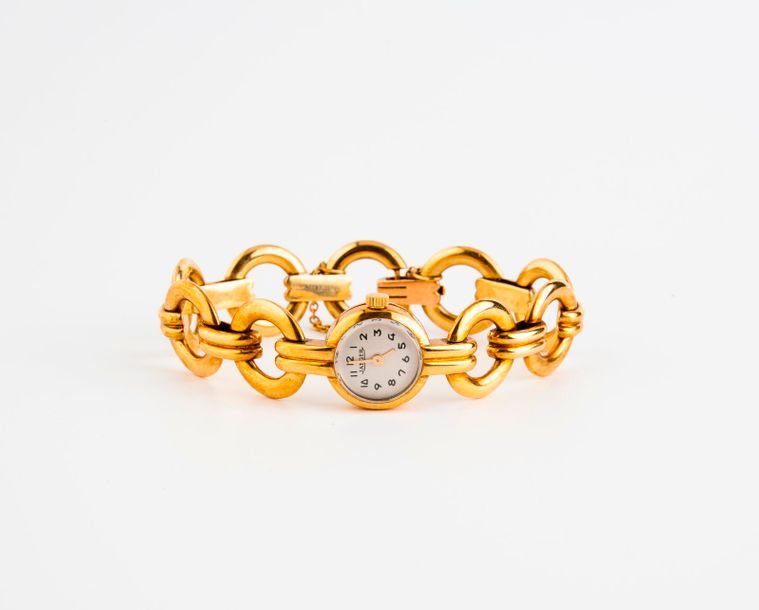 JAEGER 

Montre bracelet de dame en or jaune (750). 

Boîtier rond. 

Cadran à f&hellip;