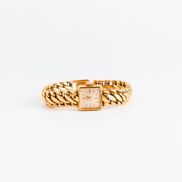 LONGINES 

Montre bracelet de dame en or jaune (750).

Boîtier carré. Cadran à f&hellip;