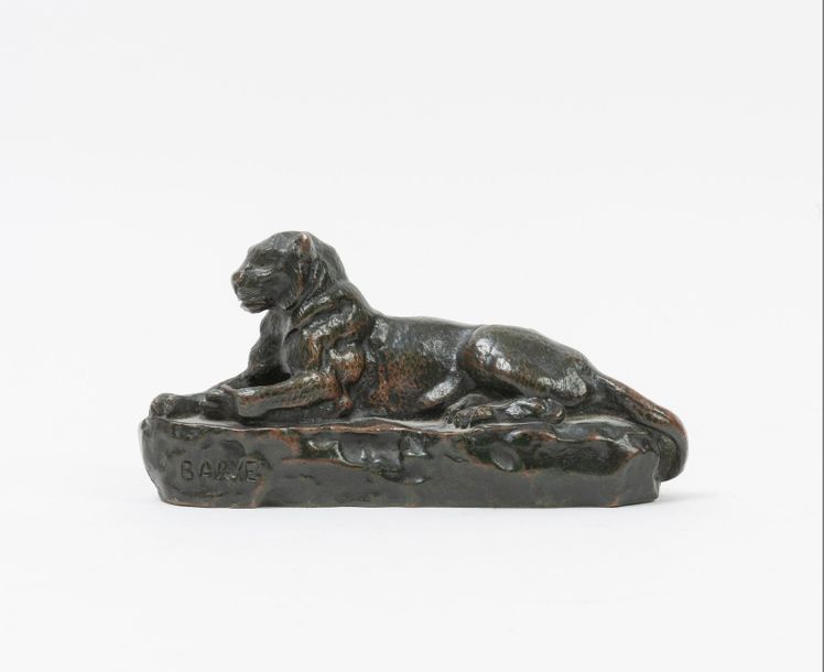 D'après Antoine Louis BARYE (1796-1875) 

Tigre couché. 

Epreuve en bronze à pa&hellip;
