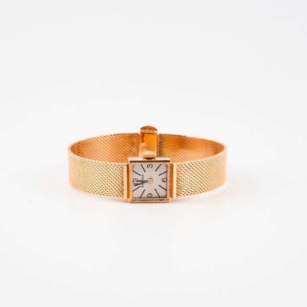 ADMIRA 

Montre bracelet de dame en or jaune (750).

Boîtier carré. 

Cadran à f&hellip;