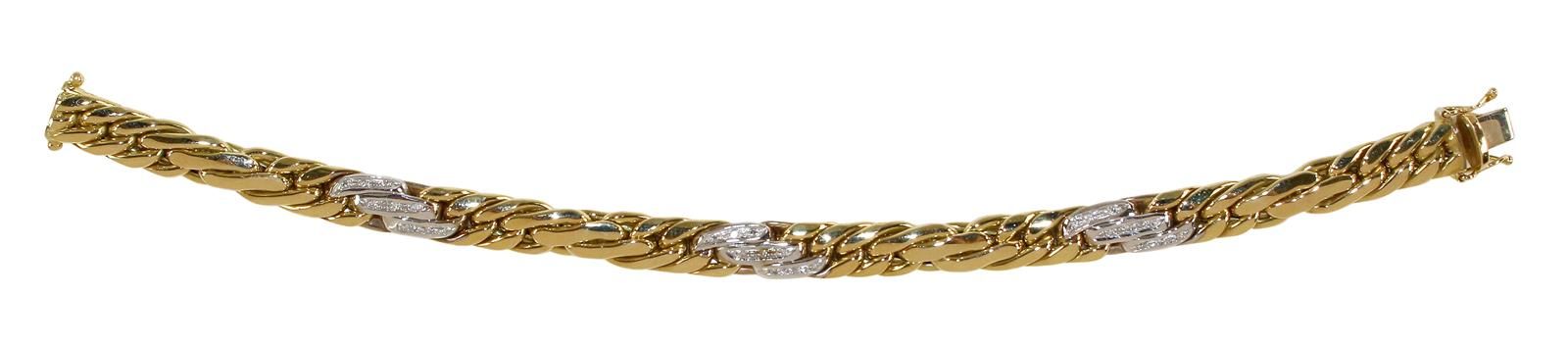Armband mit ca. 30 Diamanten. 永恒的手镯，装饰艺术风格，750黄金和白金。杆状元素镶嵌了约30颗小钻石。长：20,2厘米。重量34&hellip;