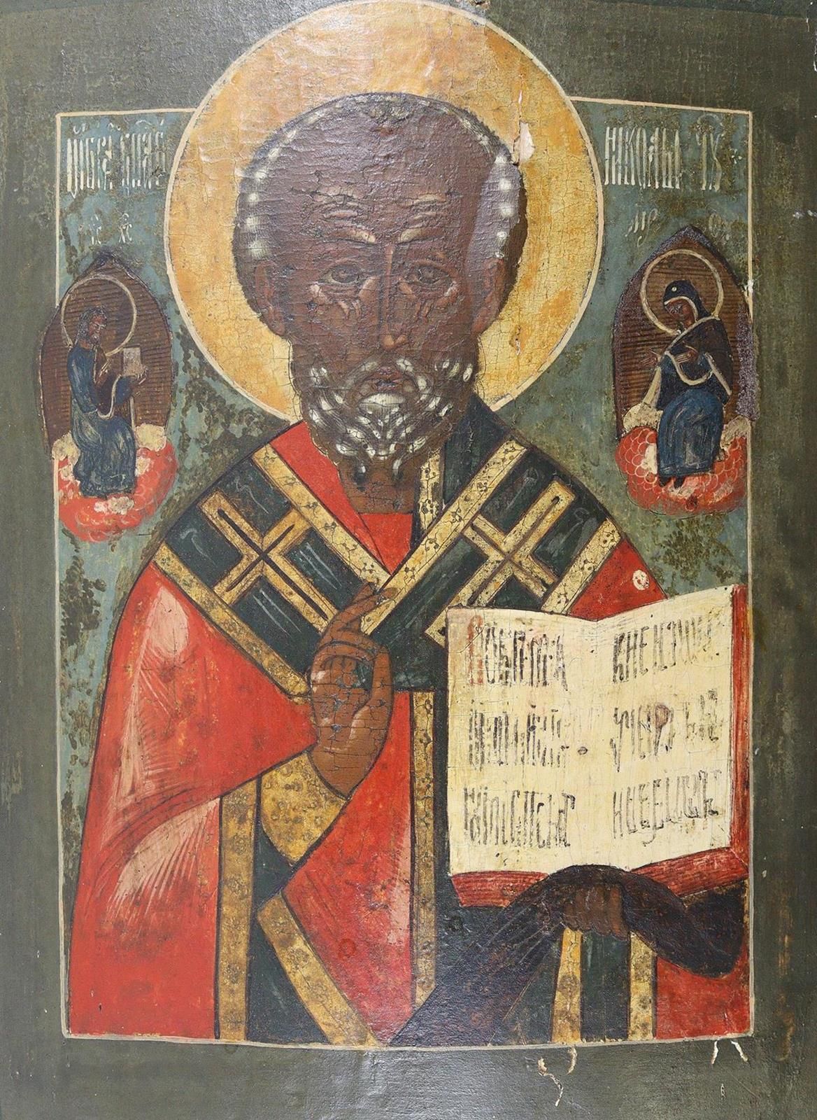 Heiliger Nikolaus von Myra. 可能是18/19世纪的俄罗斯，白垩地上的蛋彩画在木头上。圣尼古拉斯打开圣经，做着祝福的手势，被基督和玛丽&hellip;