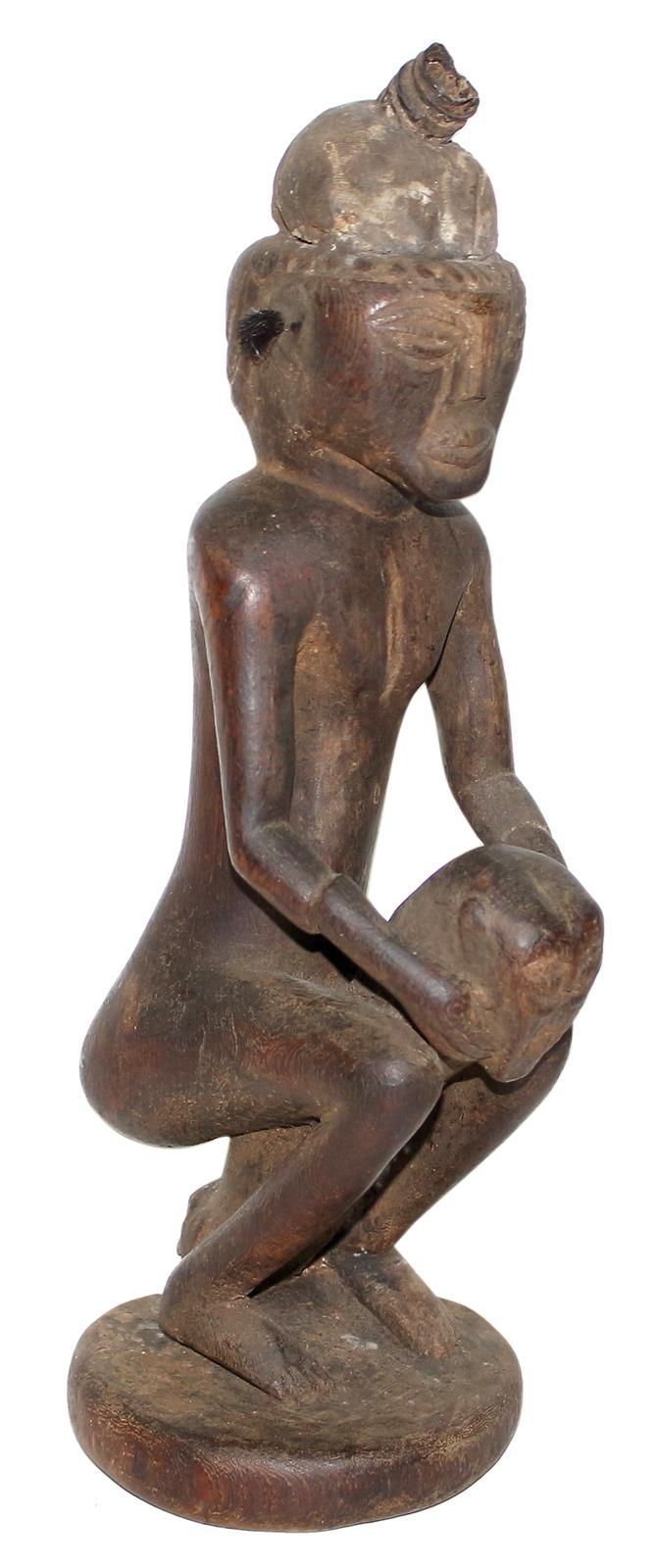 Songye Kongo. Songye fetish figure. Male figure with medicine package. Sitting o&hellip;