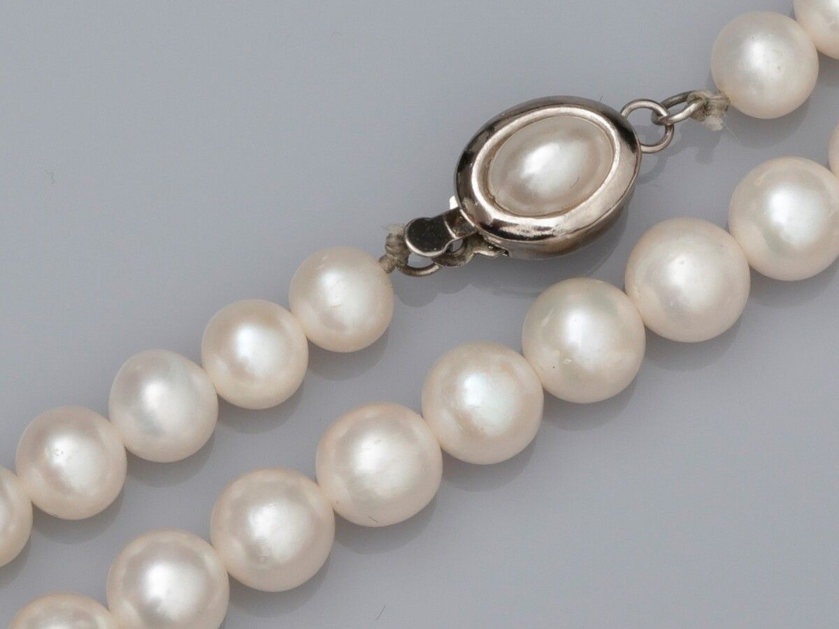 Null Freshwater cultured pearl necklace diameter 7/7.5 mm, fancy clasp. L: 43 cm