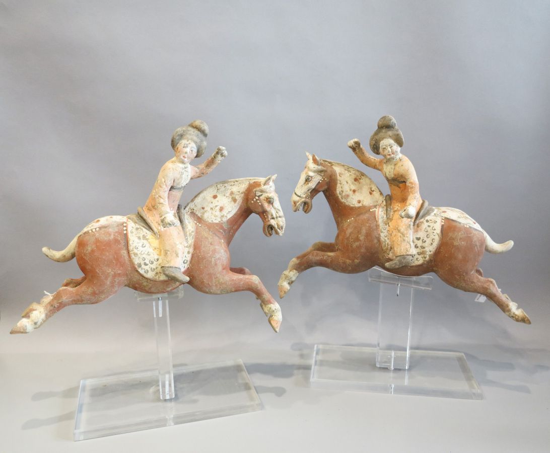 Null Pair of polo players riding their mount in a jump. 

Terra cotta with engob&hellip;