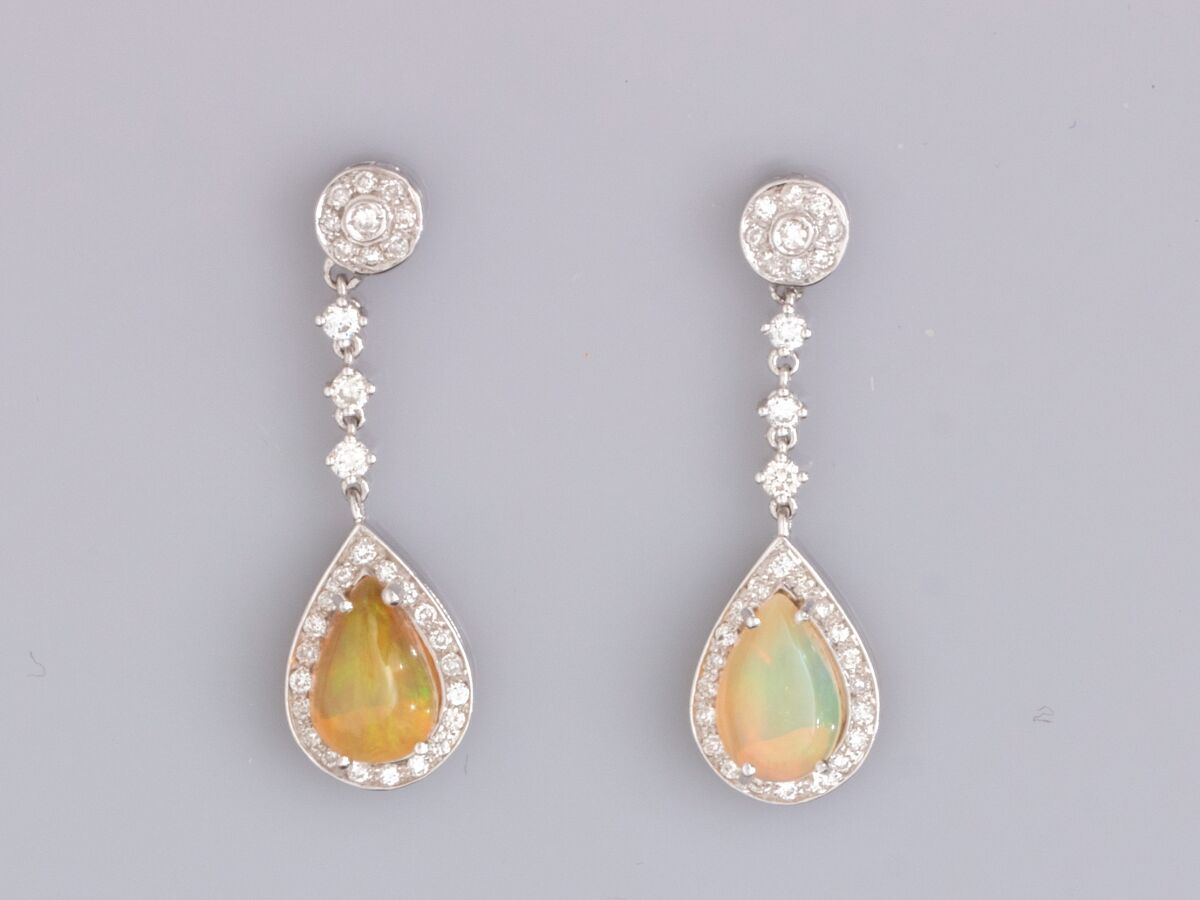 Null Pair of earrings in 18K white gold, set with cabochon pear opals, surrounde&hellip;