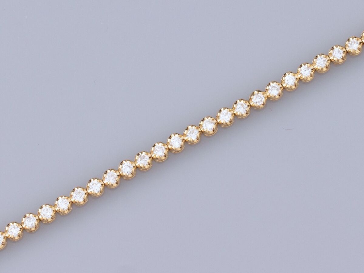 Null Fin bracelet rivière en or jaune 750°/°° (18K), serti de diamants taille br&hellip;