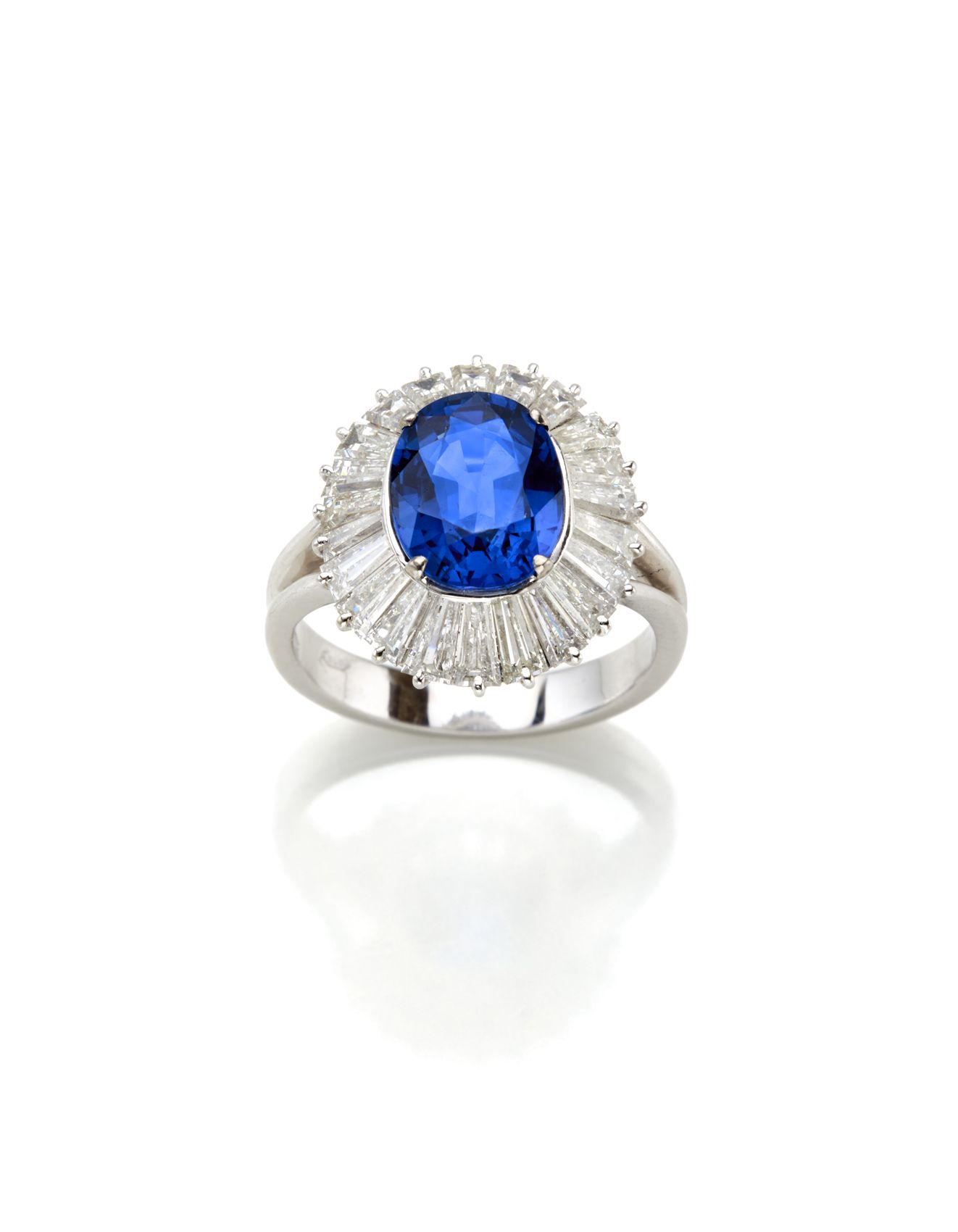 Null Oval ct. 3.89 sapphire gold and platinum ring accented with tapered diamond&hellip;