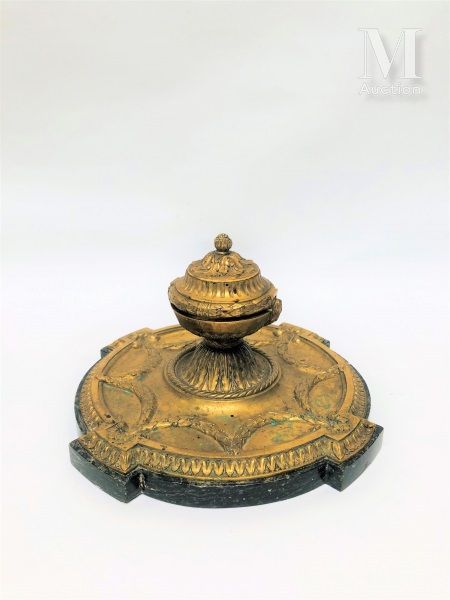 ENCRIER A round ormolu four-sided vase decorated with garlands and palmettes, wi&hellip;