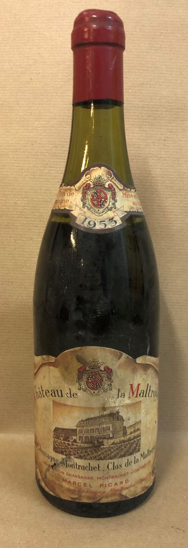 1 bouteille CHASSAGNE-MONTRACHET Ch. De la Maltroye 1953 (étiquette tachée, Bass&hellip;