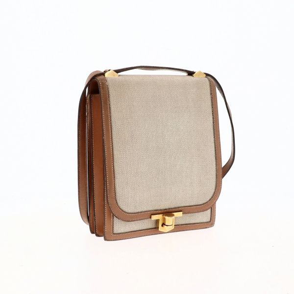 HERMÈS - 1970's Chantilly" bag

in canvas ""H"" and beige box, gold-plated metal&hellip;