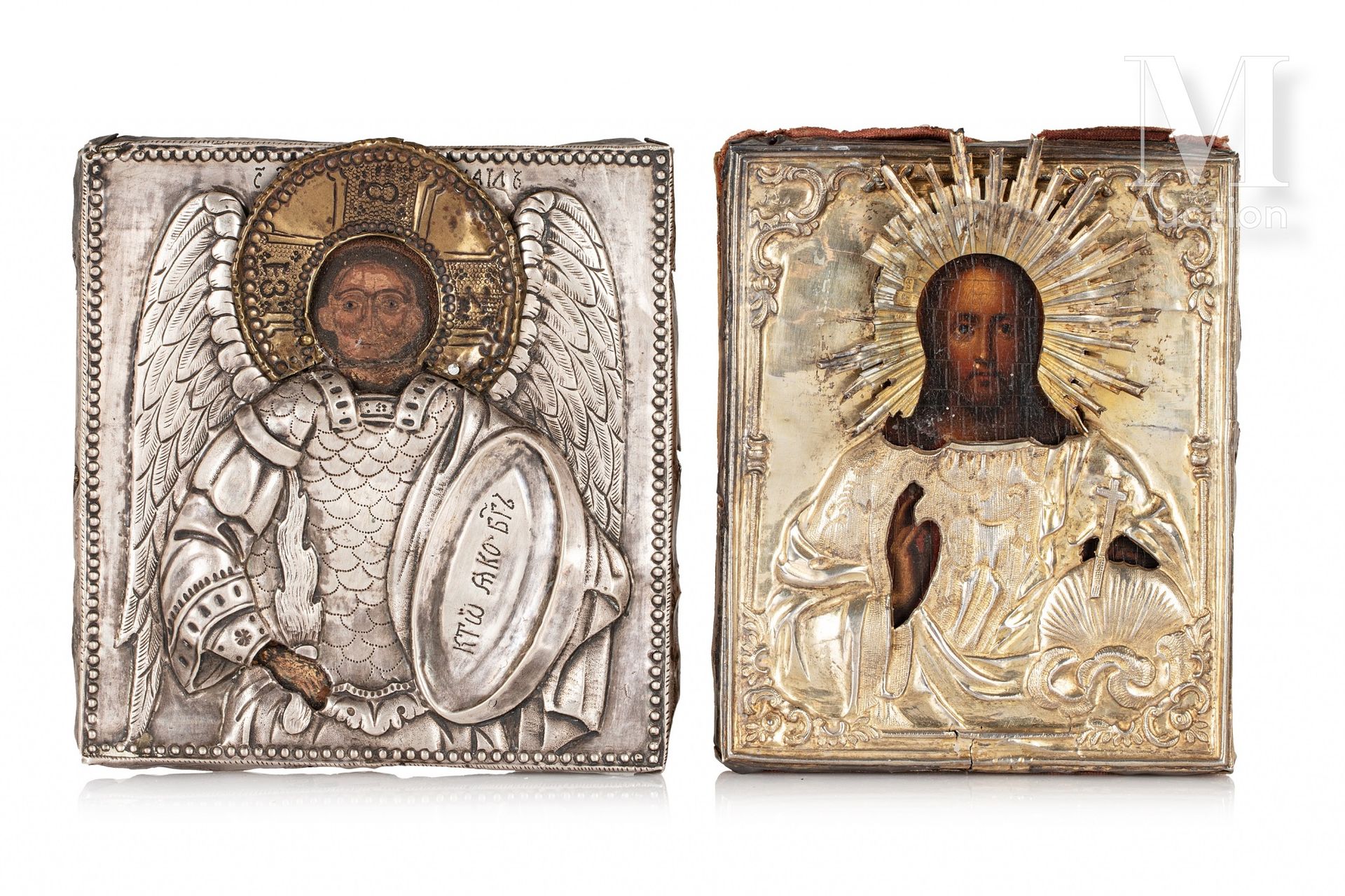 Lot de 2 icônes comprenant 
一幅基督的圣像和一幅大天使迈克尔的圣像。 

木板上的淡彩画。

银质和镀金oklads 84 zolo&hellip;
