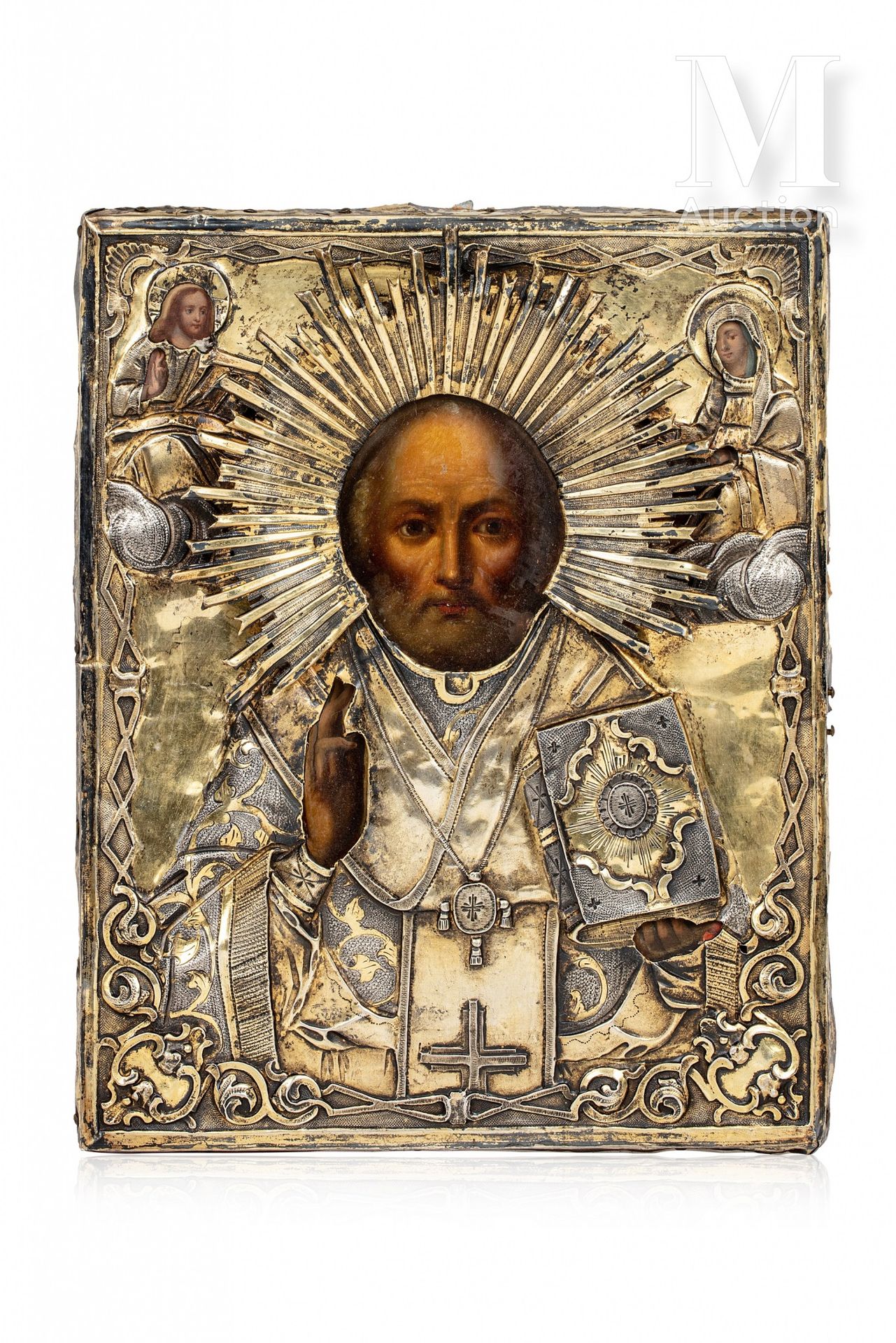 Icône de Saint Nicolas le Thaumaturge. 
木板上的淡彩画。

圣尼古拉右手拿着福音书，左手祝福。 他的头顶是基督和天主之母&hellip;