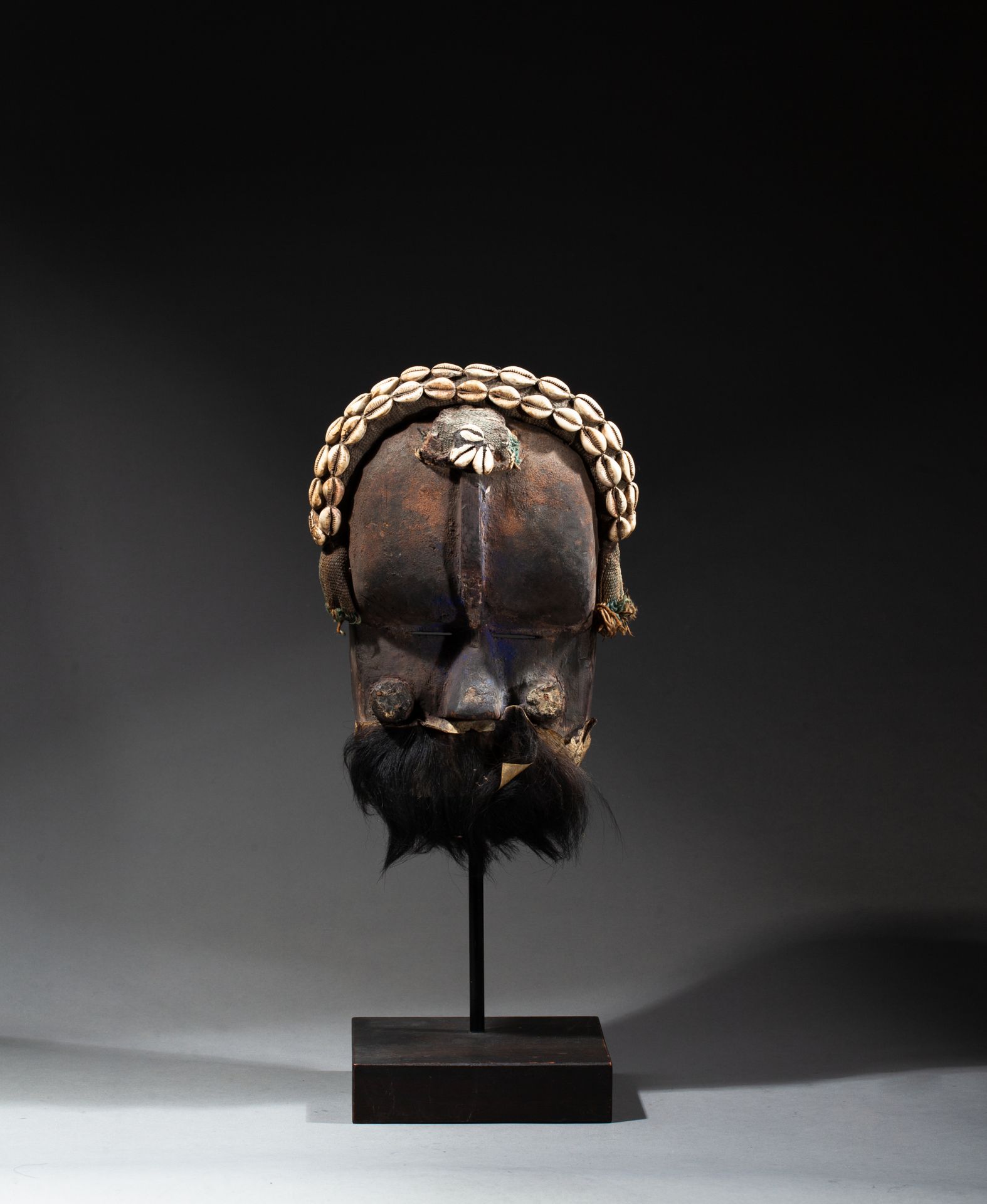 Masque de danse presenting a face with its mouth covered with animal skin, the d&hellip;