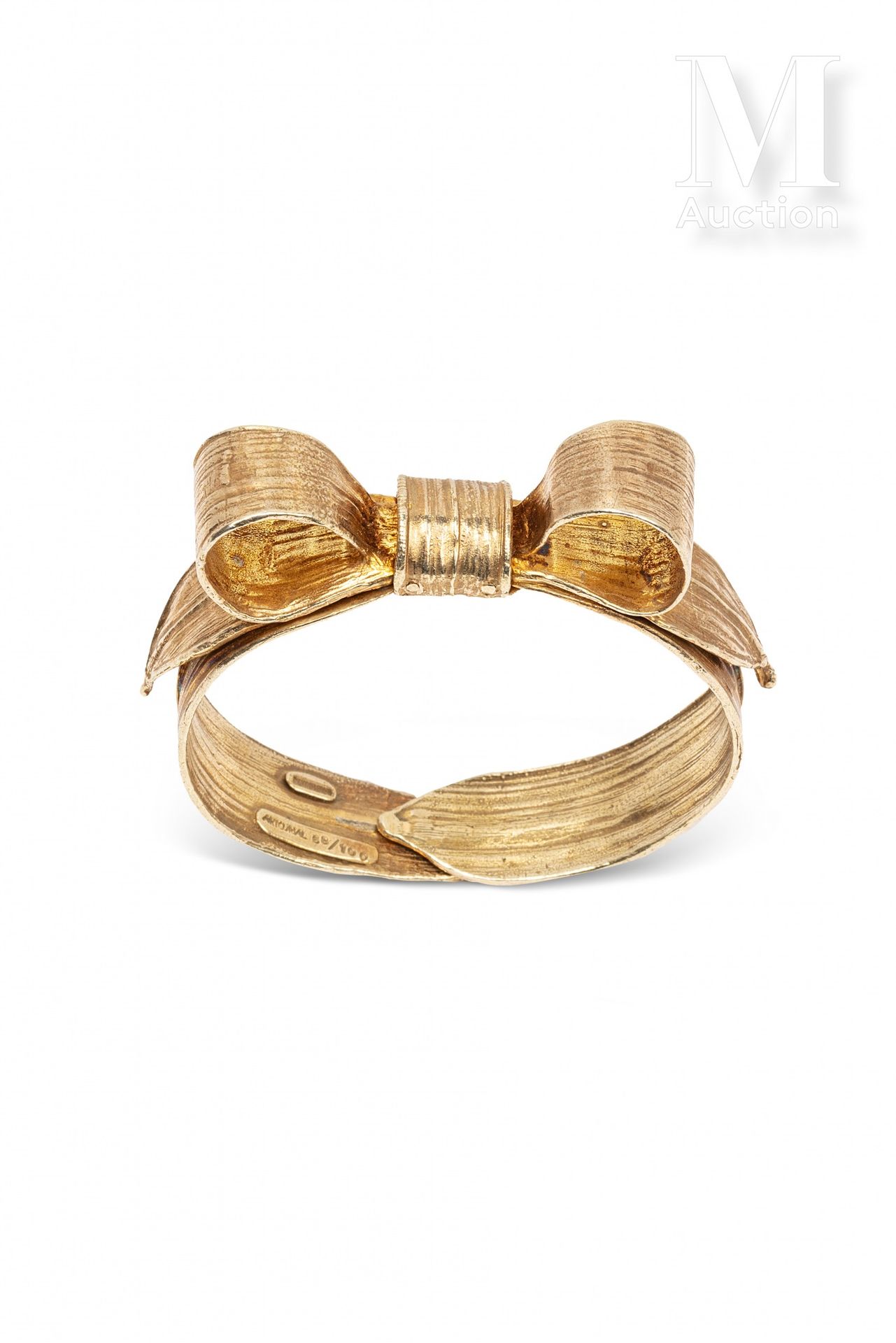 Claude LALANNE (1925 - 2019) "Knot"

1991

Rigid bracelet in silver vermeil.

Ed&hellip;
