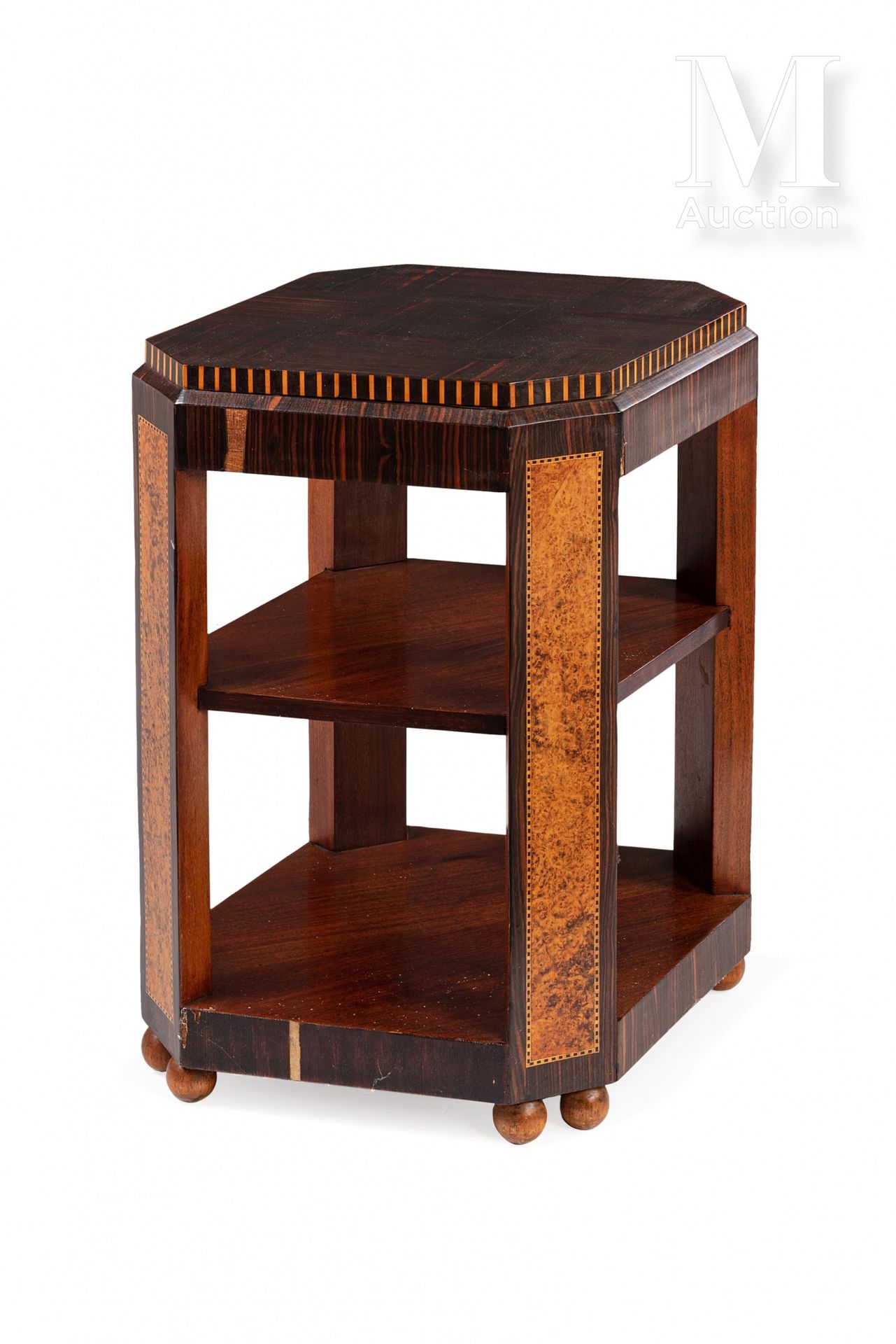 Paul FOLLOT , attribué à A middle table with an octagonal top in Macassar ebony,&hellip;