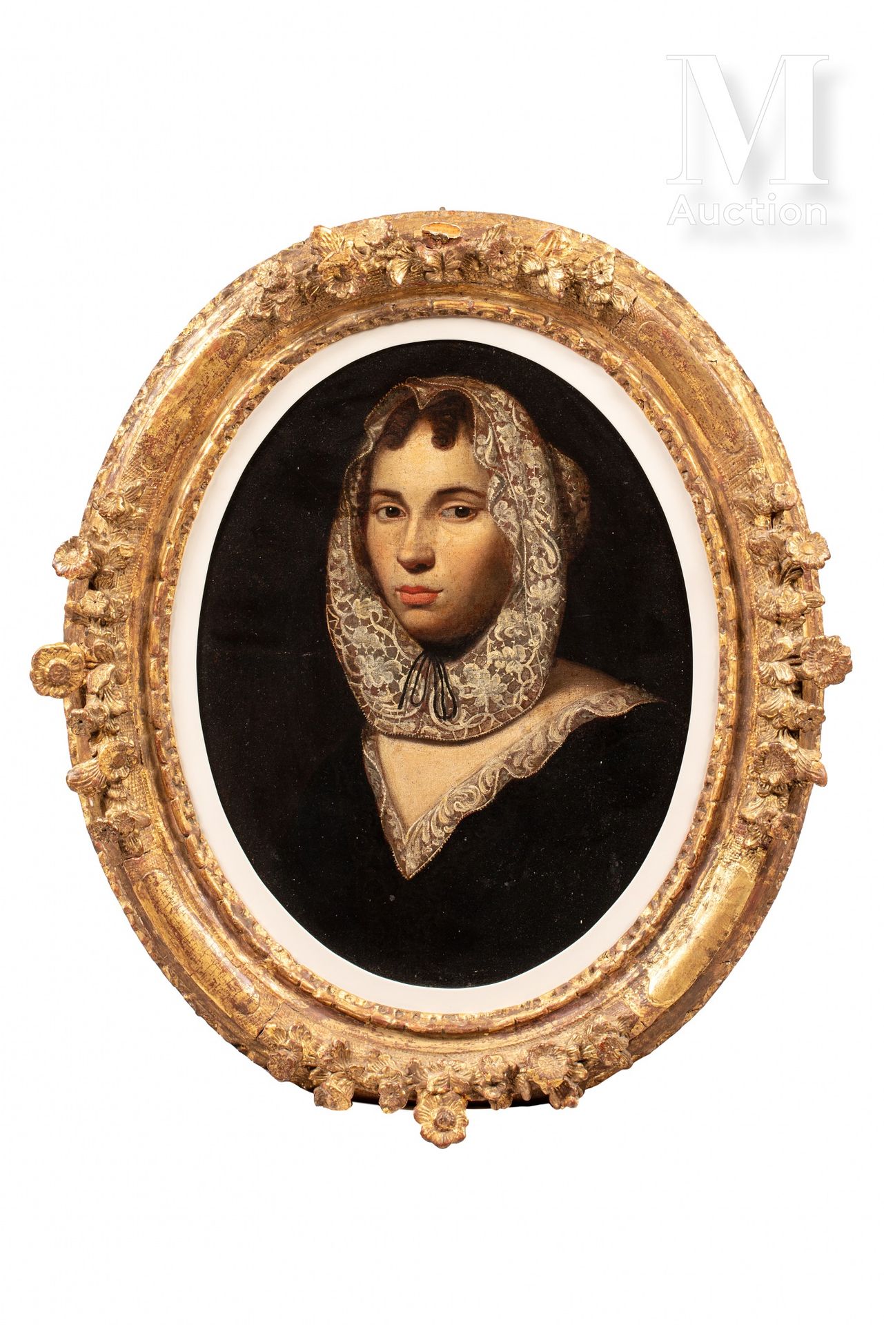Ecole Française de la seconde moitié du XVIIème 一个戴着蕾丝头饰的半身女人的肖像。

椭圆形画布上的油彩，重新做&hellip;
