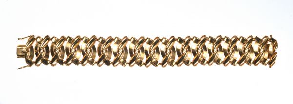 Null BRACCIALE in oro con maglie piatte e croci. Peso: 57 gr.