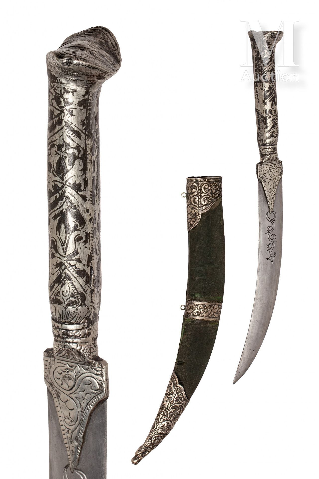 Null 小型复合奥斯曼帝国匕首 叙利亚，约1900年 由银色尼罗河Yatagan刀柄和雕刻的钢制弯刀组成。绿色天鹅绒包裹的刀鞘，夹钳，吊环和压印银色的悬挂环。&hellip;