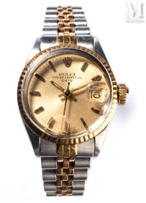 ROLEX Oyster Perpetual Date 

Circa 1969

Steel case and 750 thousandths yellow &hellip;