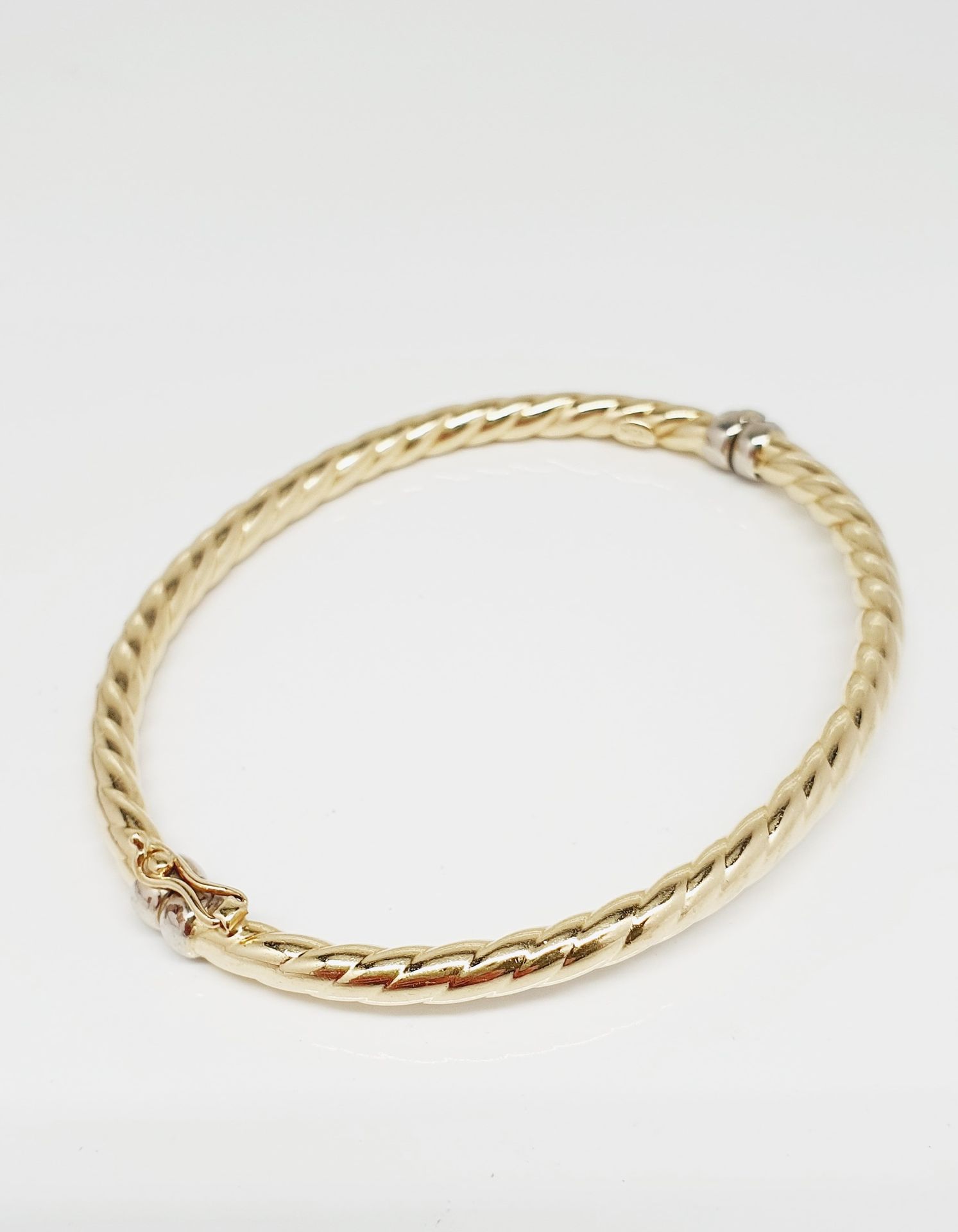 BRACELET OR Bracelet jonc rigide ouvrant et torsadé en or jaune et or gris 14k (&hellip;