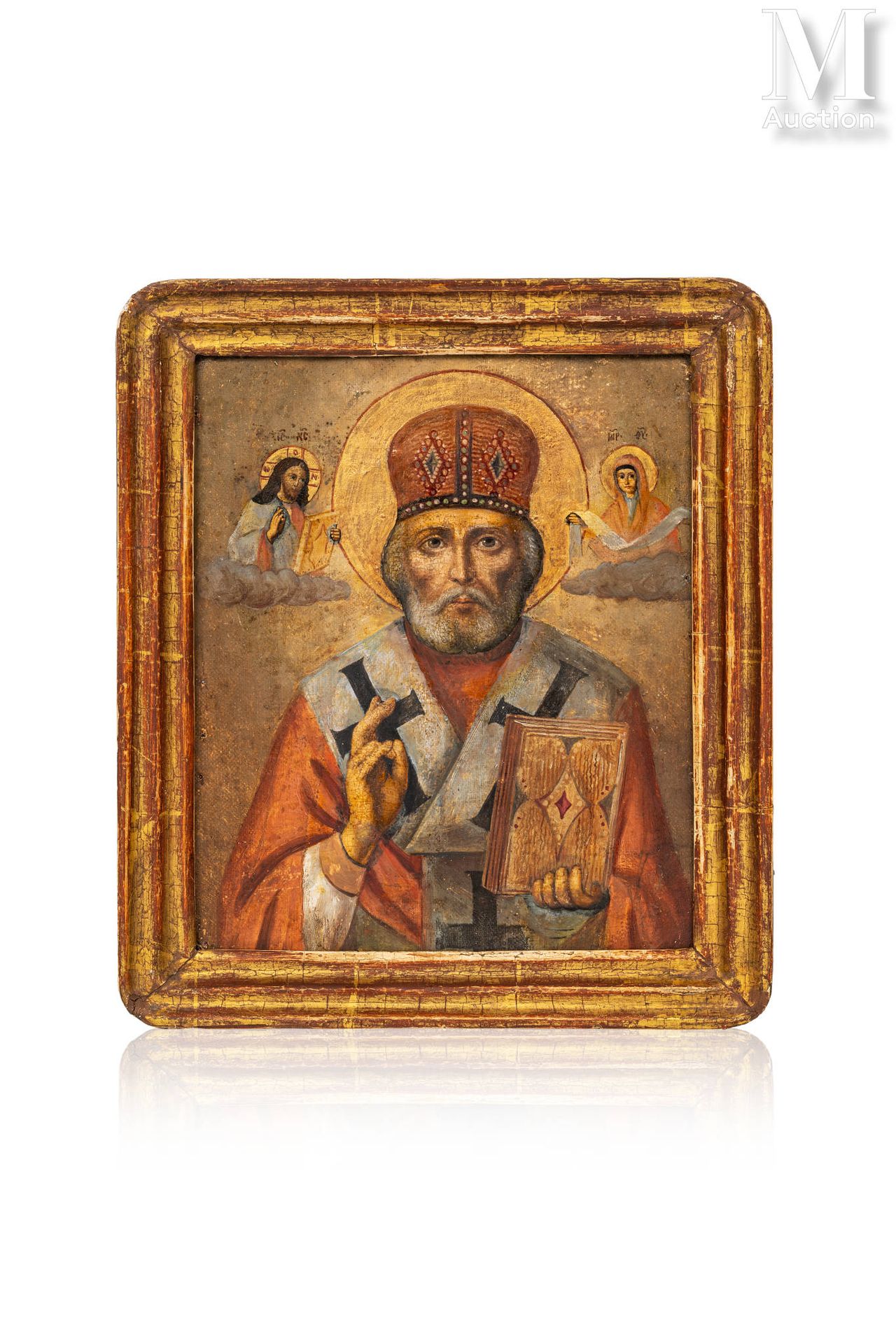 Icône de Saint Nicolas le Thaumaturge. 
Tempera and gold on wood. In a gilded wo&hellip;