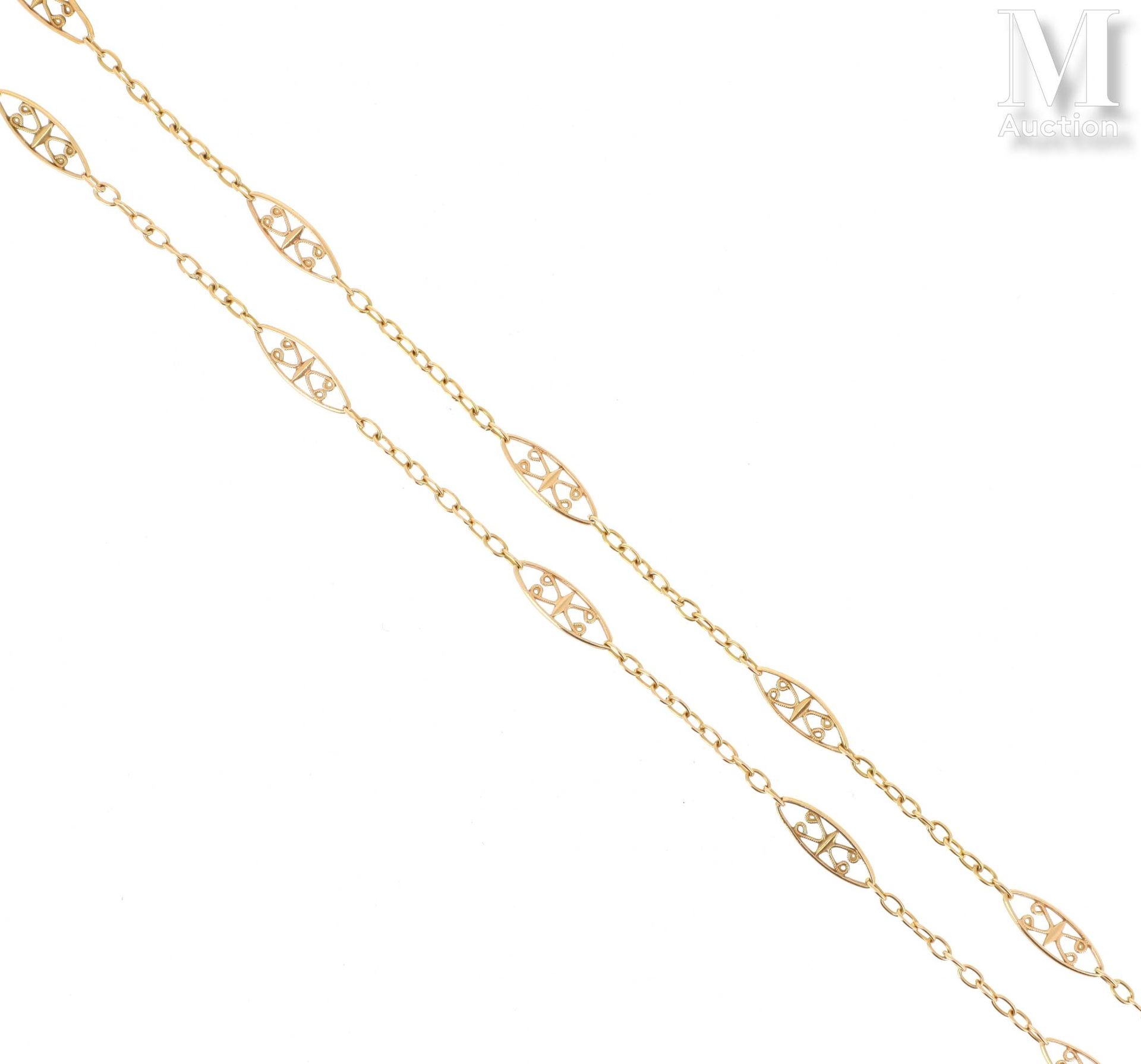 Sautoir maillons navettes 18K(750°/°)黄金长项链，镂空花丝链接。

毛重：14,4克。

长：74厘米
