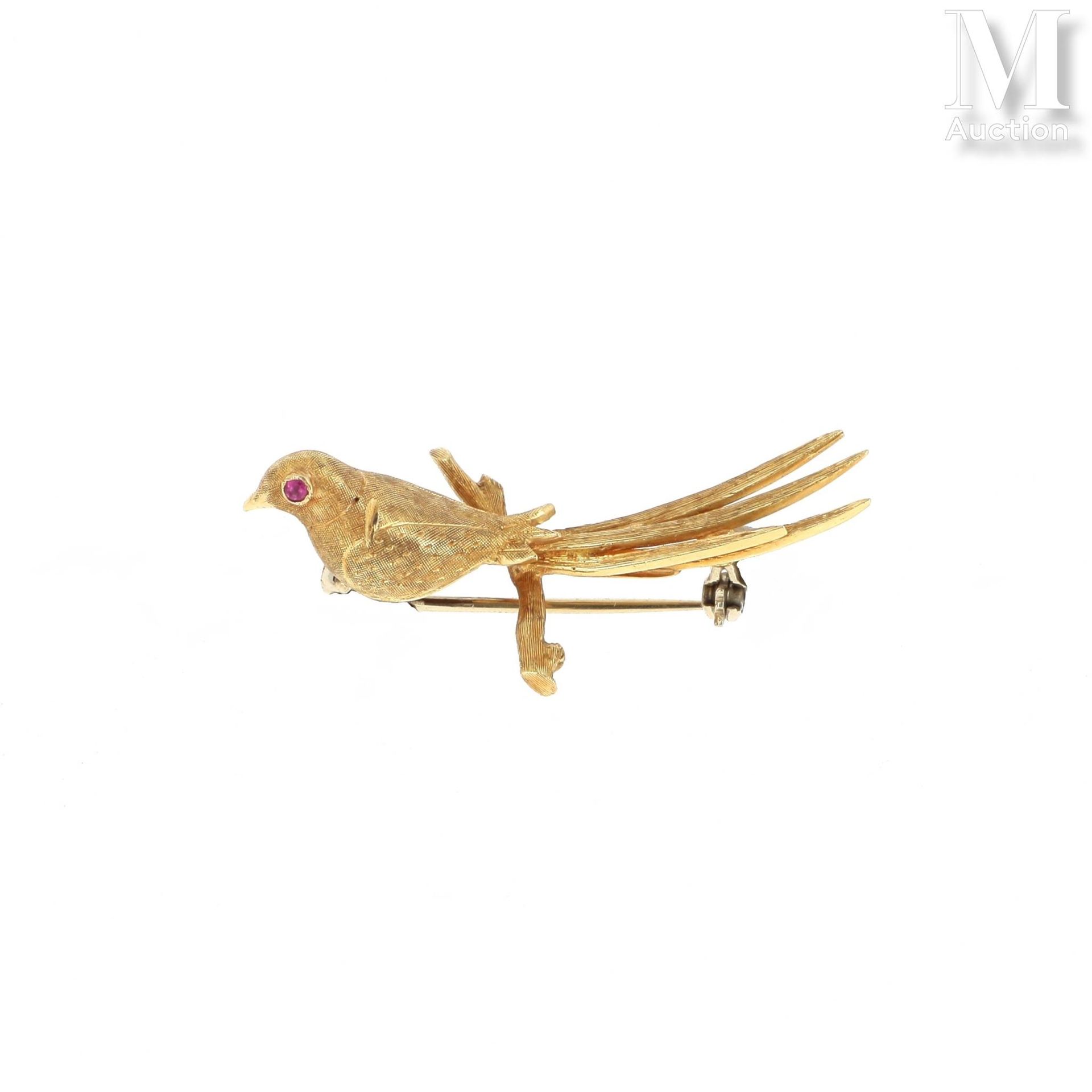 Broche oiseau Broche en or jaune 18k (750 millièmes) figurant un oiseau posé sur&hellip;