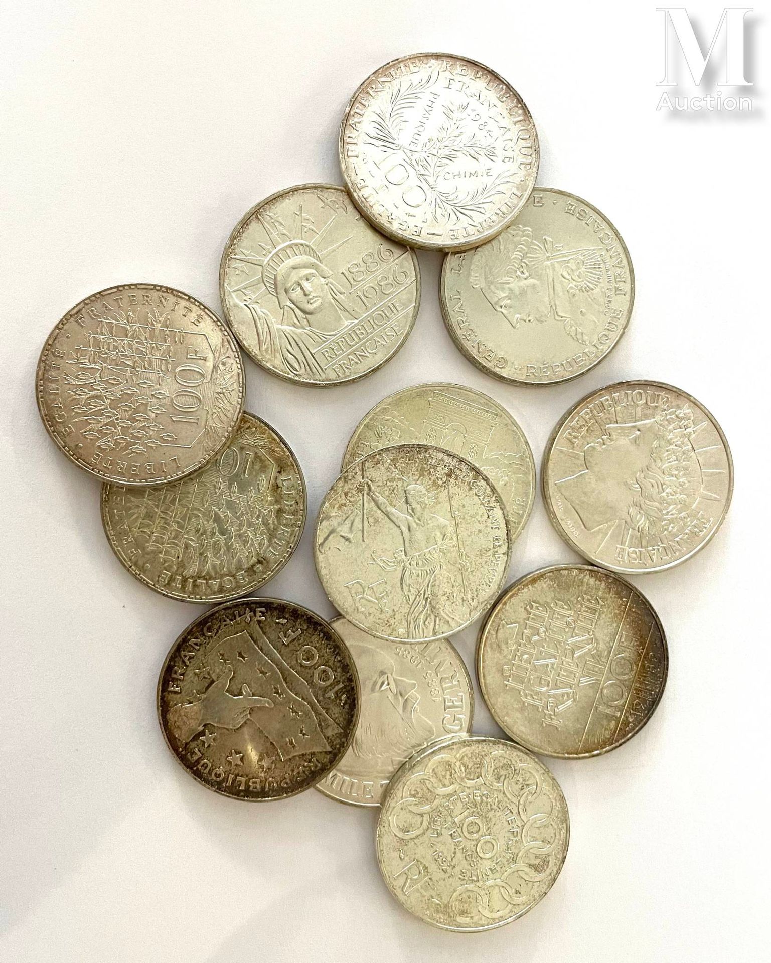France - Cinquième République 12枚不同年份的100法郎纪念银币（万神殿、玛丽-居里、巴黎解放......）。

状态 : 多样化&hellip;