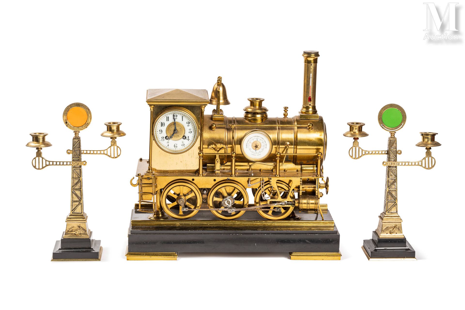 Garniture de cheminée 一个描绘蒸汽机车的壁炉，030，2个烛台发出铁路信号。这个机车有时钟、气压计、温度计和指南针。 	

长：42厘米 &hellip;