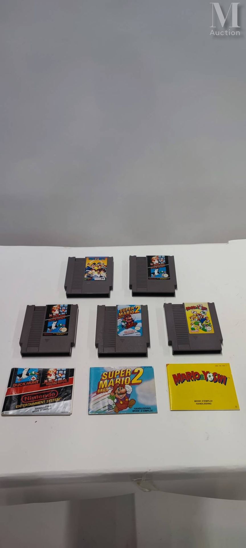 LOT NINTENDO NES PAL 任天堂的Nes伙伴套装

一套九个游戏，包括四个盒装游戏。

马里奥博士，耀西的饼干，俄罗斯方块，双龙二号，马里奥兄弟&hellip;