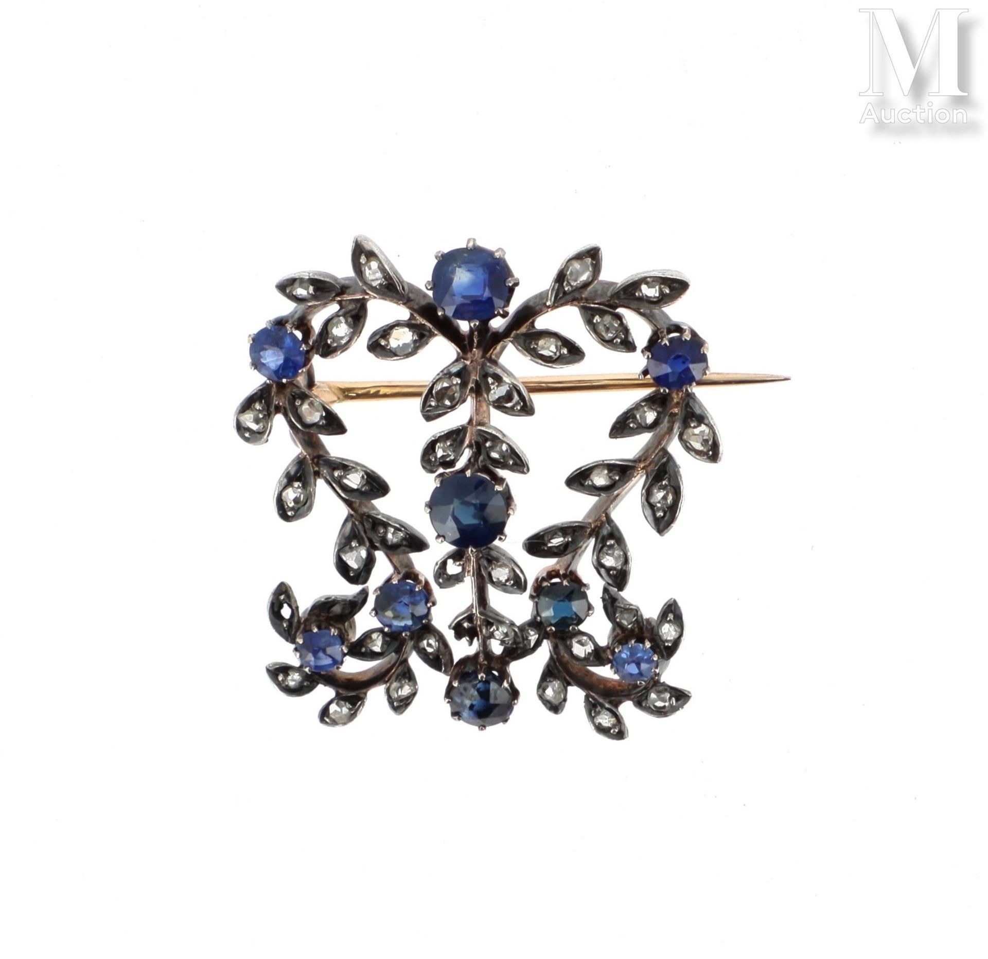 Broche feuillages saphirs 银质（800°/°）和18K（750°/°）黄金胸针，叶状卷轴上镶嵌着钻石玫瑰，并以圆形蓝宝石作为装饰。 
&hellip;