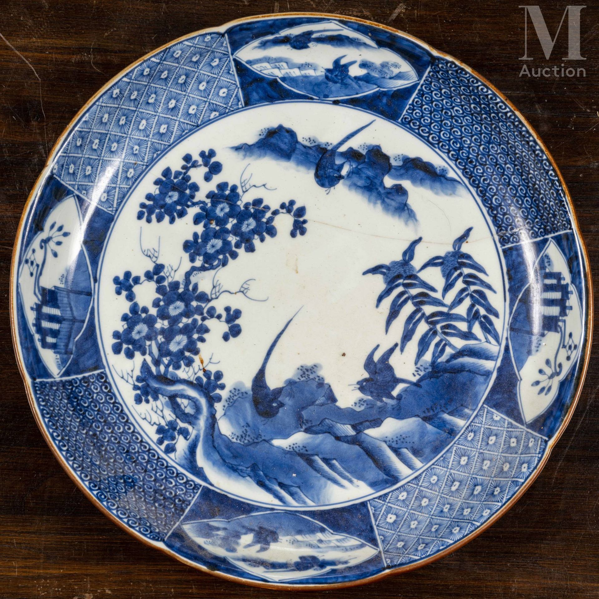 JAPON, XIXe siècle Two large blue and white porcelain dishes decorated with bird&hellip;