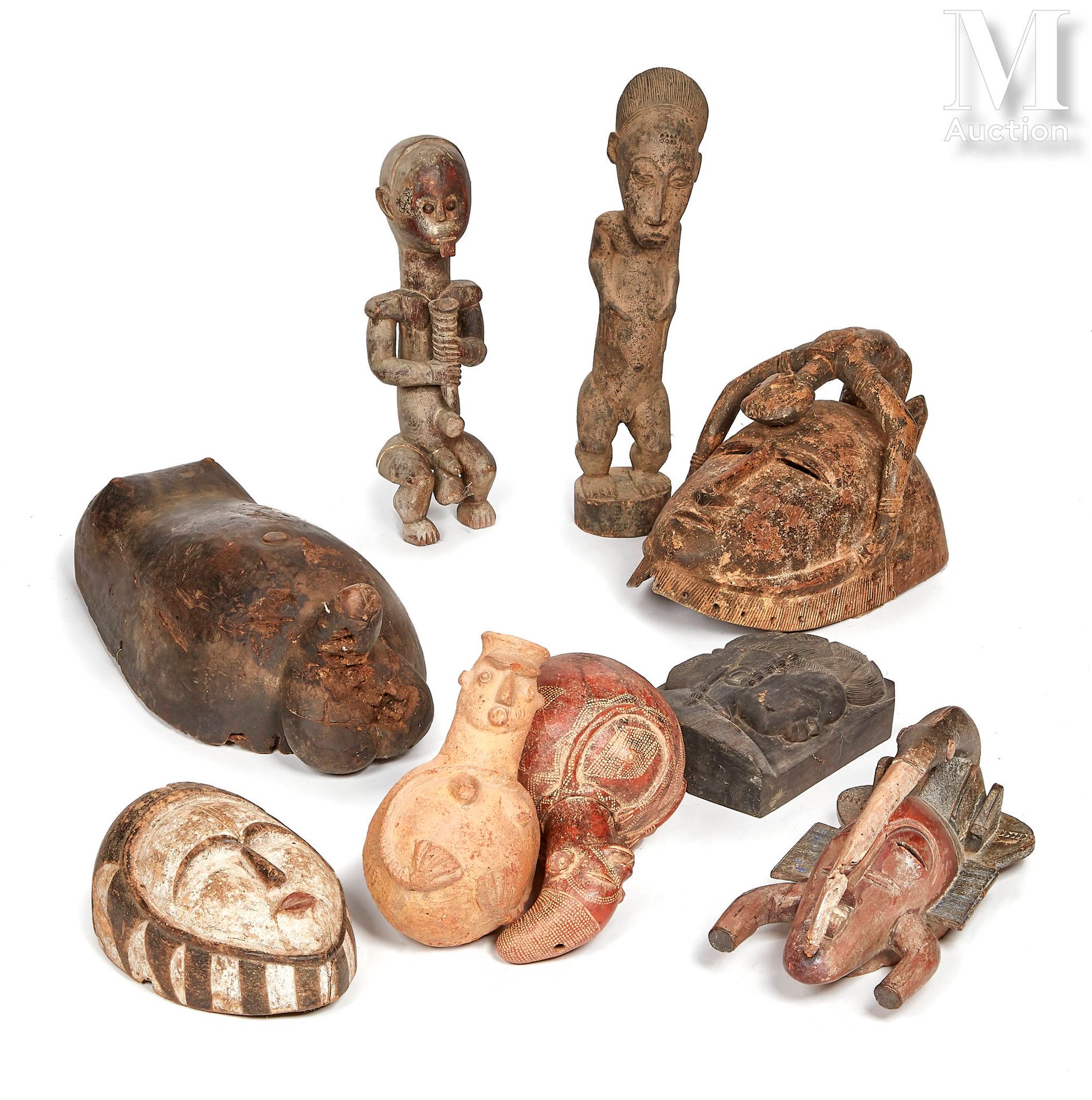 10 masques et statues Dans le style de l’Afrique ancestrale
Vendu en l’état