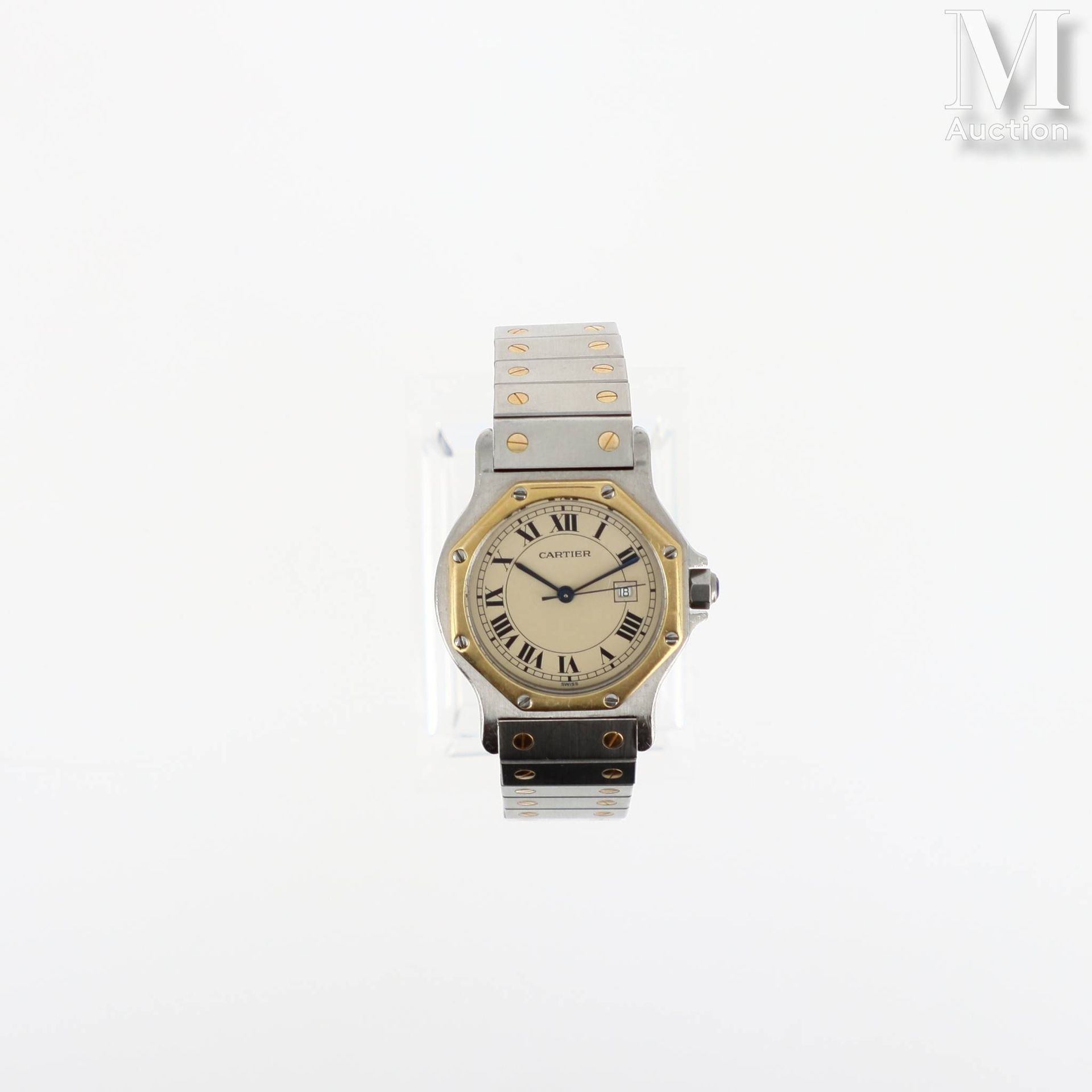 Cartier 桑托斯八角形
约1980年
男士腕表，八角形 
精钢表壳，有签名和编号，750千分之一黄金表圈
米色表盘，罗马数字，日期窗口位于3点钟方向 
机&hellip;