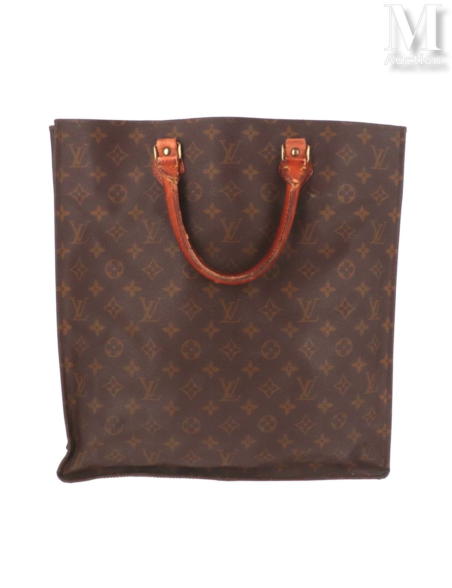 LOUIS VUITTON Flat" bag
in Monogram canvas and natural leather, golden brass tri&hellip;