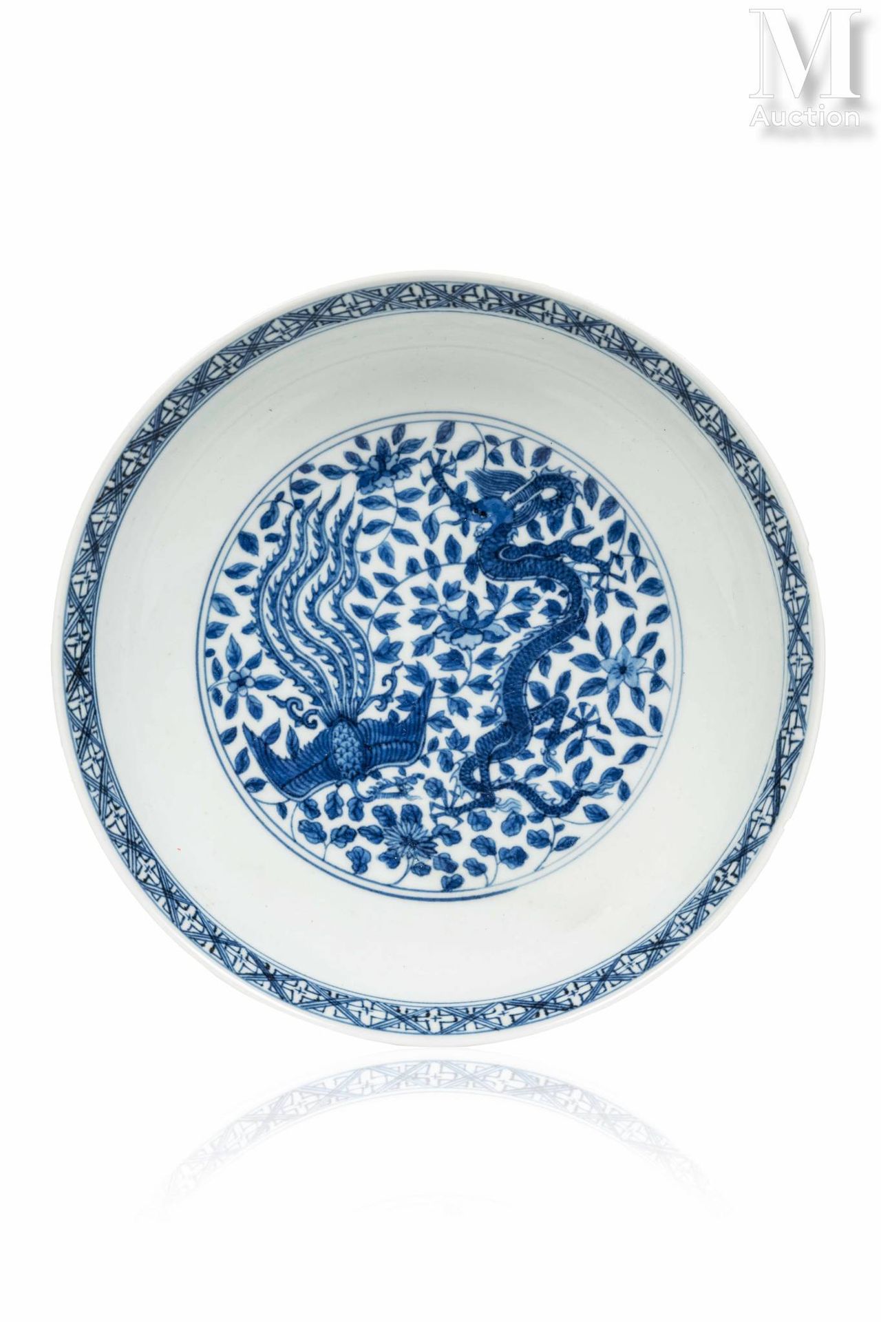 *CHINE, Epoque Kangxi, XVIIIe siècle Piatto in porcellana

decorato in blu e bia&hellip;