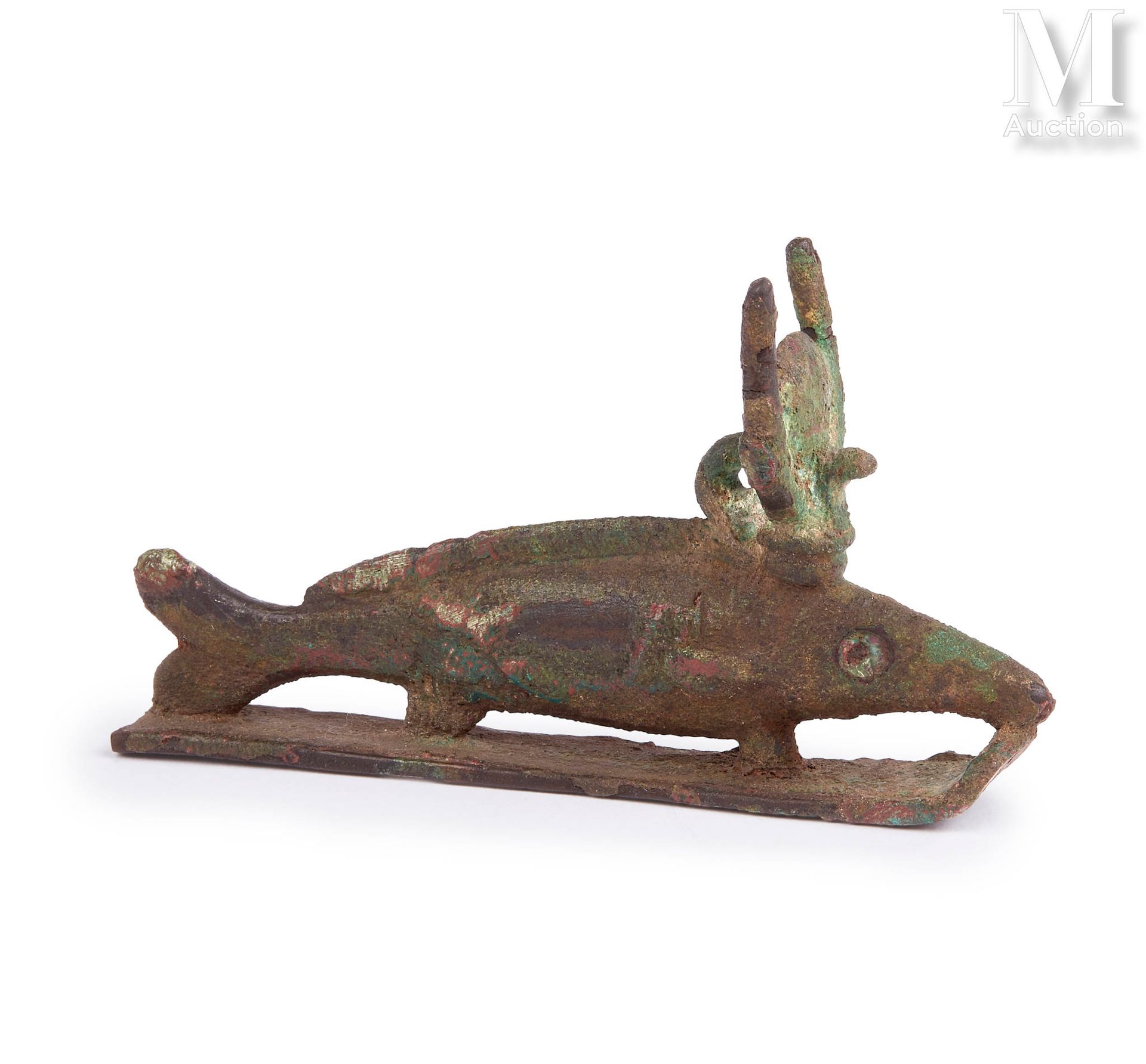 Figurine d’oxyrhynque on a sleigh, wearing the hathoric crown.
Bronze with smoot&hellip;
