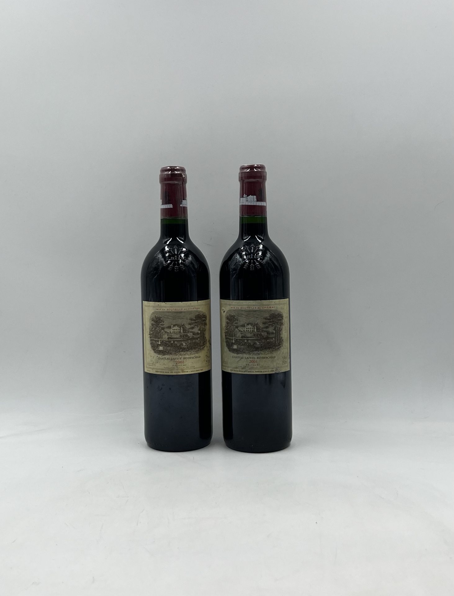 2 bouteilles CH. LAFITE-ROTHSCHILD, 1° cru Pauillac 2001 (es, et, ela)