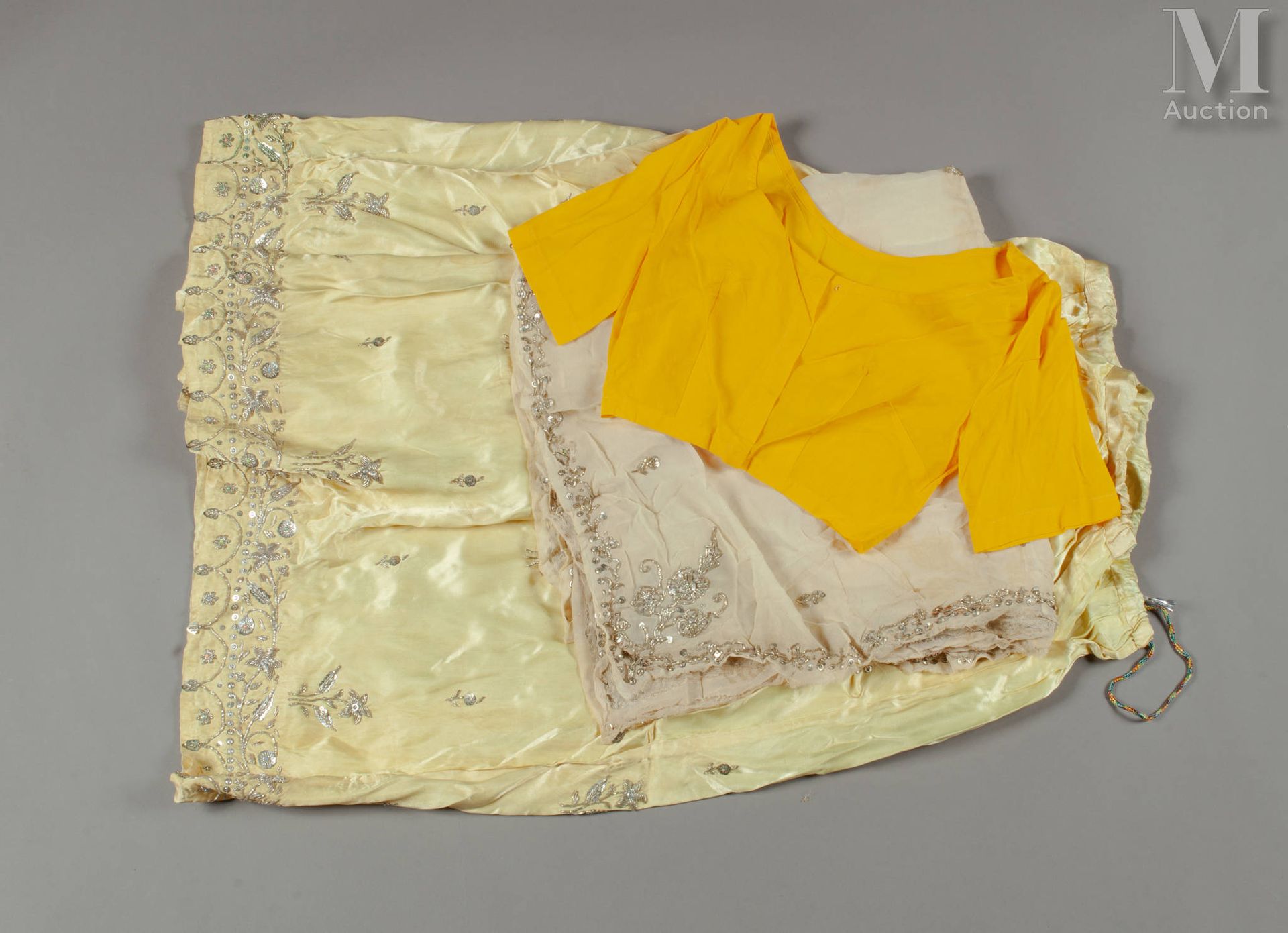 INDE Feminine party ensemble including skirt, blouse and shawl. The light yellow&hellip;