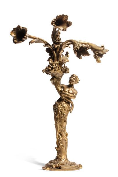 Null Grand candélabre en bronze doré figurant un faune portant une corne d'abond&hellip;