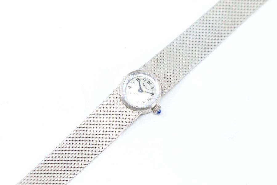 FLAMOR FLAMOR

Ladies' bracelet watch in metal, round case, dial with silver bot&hellip;